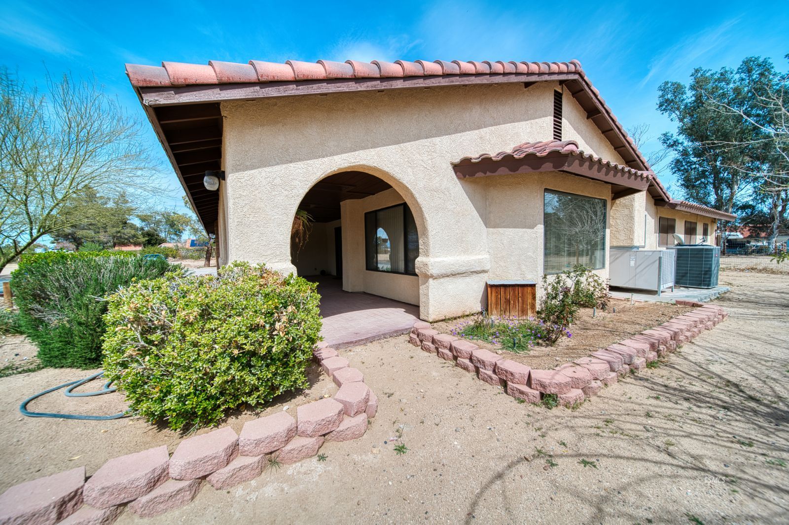 1657 Autumn Avenue Ridgecrest, CA 93555 - Photo 32 of 36 a front view of a house with garden