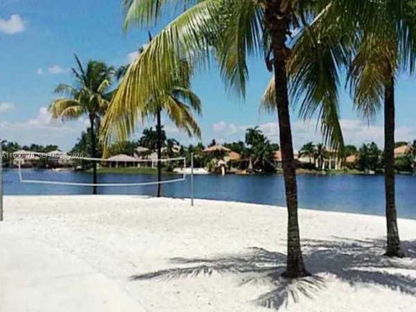 a view of a swimming pool with a chair