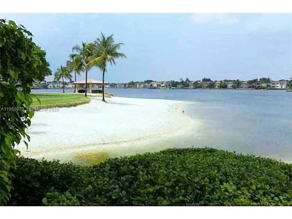 a view of a lake from a yard