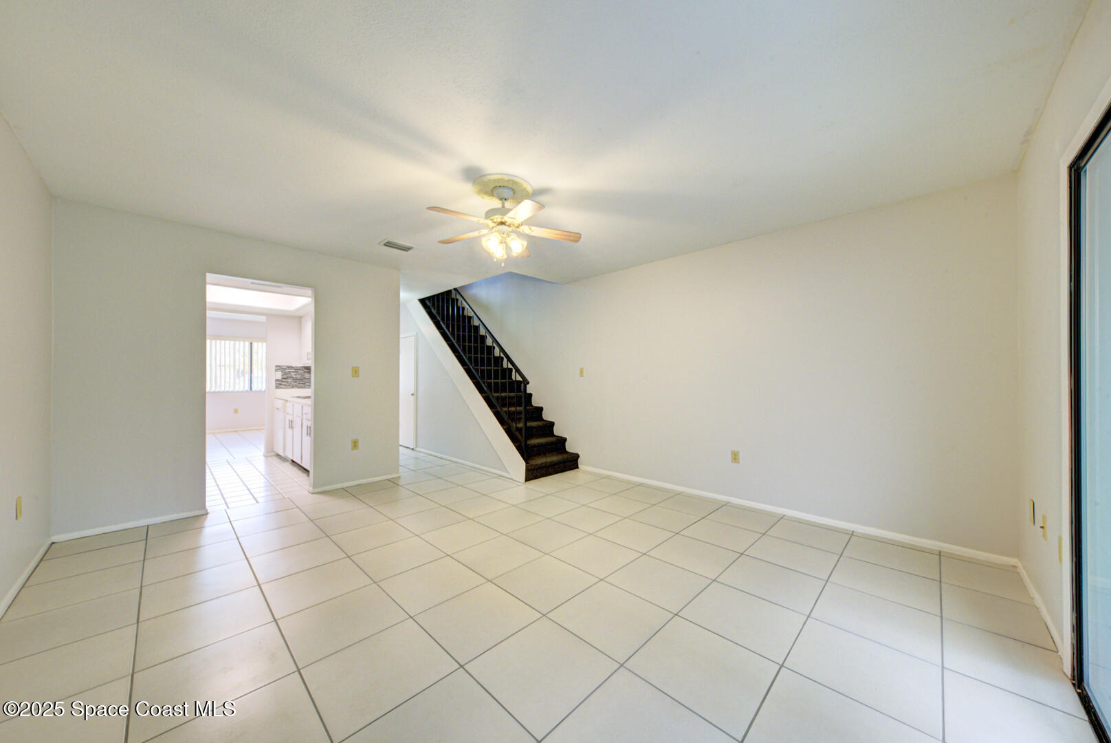 4749 Sisson Road Titusville, FL 32780 - Photo 15 of 30 family room with tile floor