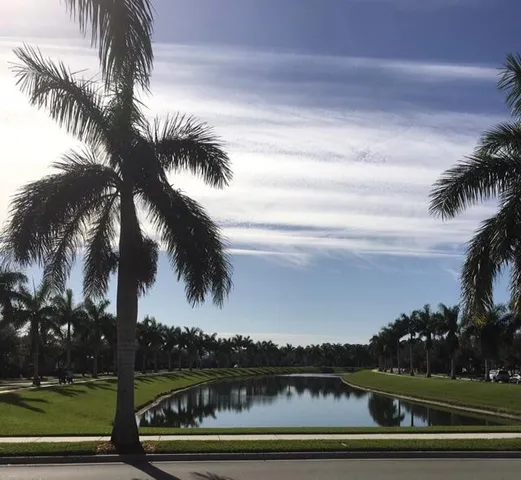a view of lake with a yard