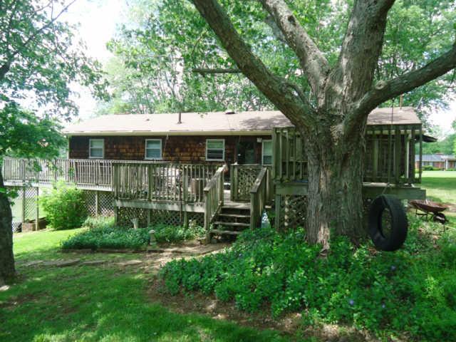 2155 Neelys Bend Road Madison, TN 37115 - Photo 13 of 18 Back Exterior-Home Has Two Tier Deck in Back Which Also Extends Around to Side of Home
