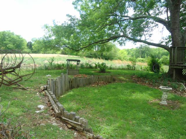 2155 Neelys Bend Road Madison, TN 37115 - Photo 14 of 18 Back Lawn Backs Up to Vacant Acreage Tract