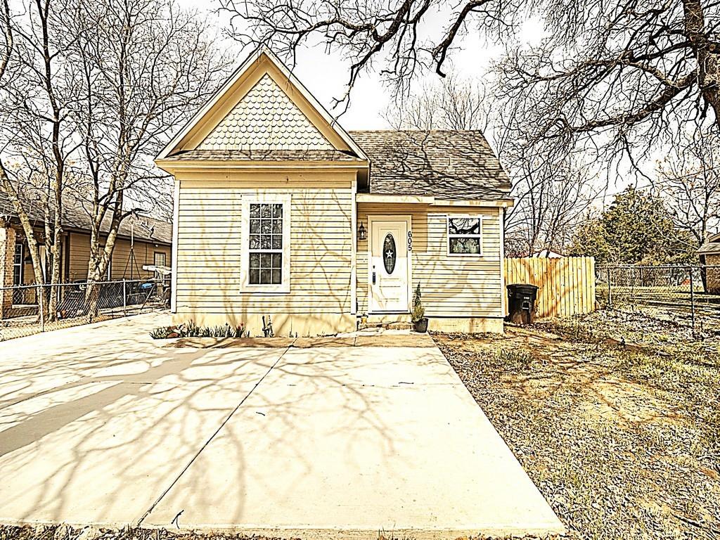 605 Olive Street Cleburne, TX 76031 - Photo 35 of 40 a front view of a house