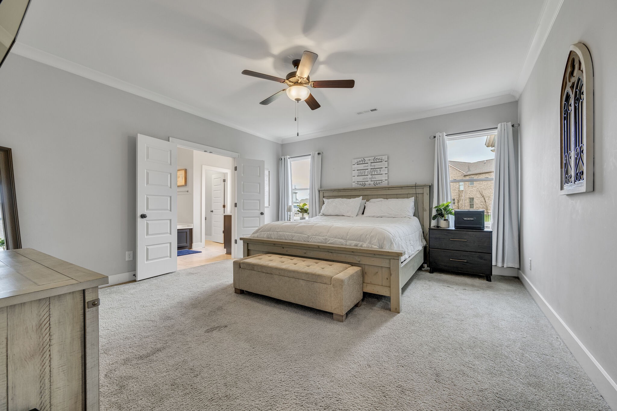 787 Plowson Road Mount Juliet, TN 37122 - Photo 11 of 30 a spacious bedroom with a bed and a cabinets