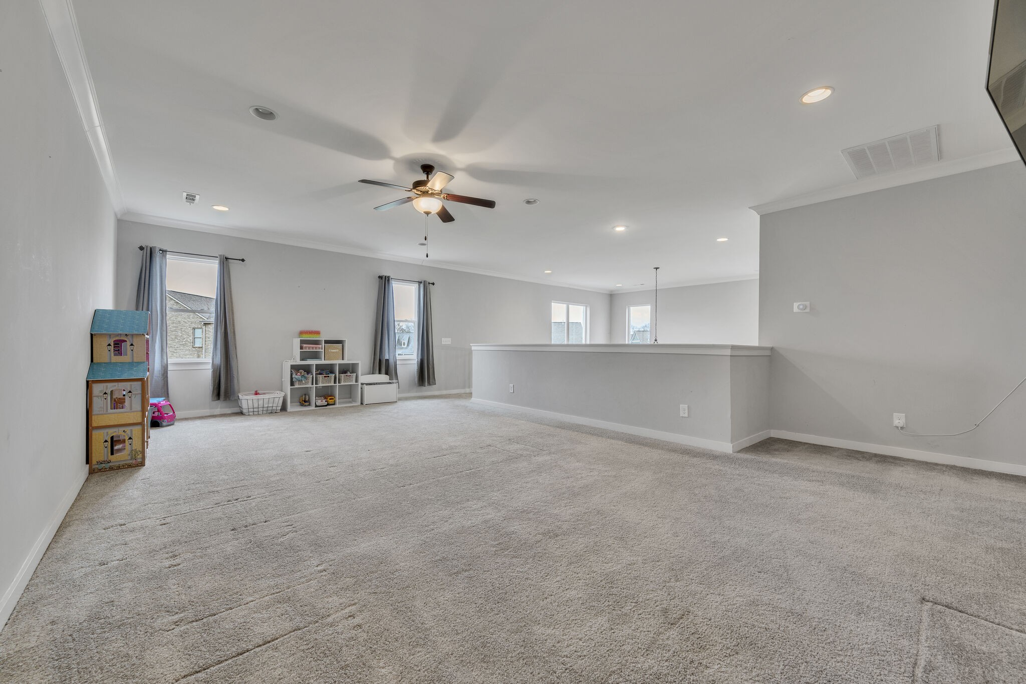 787 Plowson Road Mount Juliet, TN 37122 - Photo 20 of 30 a view of a livingroom with furniture and a ceiling fan