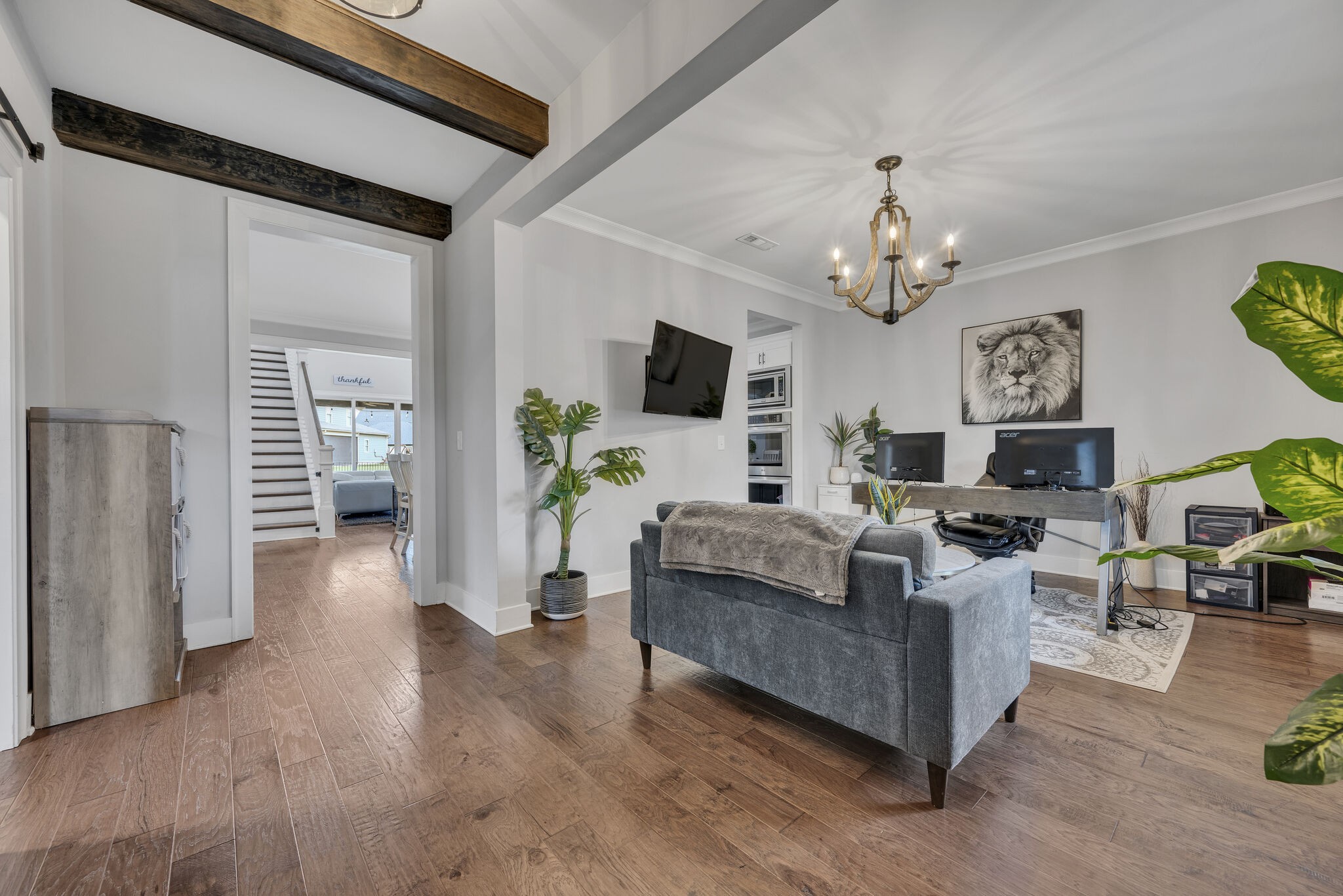 787 Plowson Road Mount Juliet, TN 37122 - Photo 3 of 30 a living room with furniture and a flat screen tv