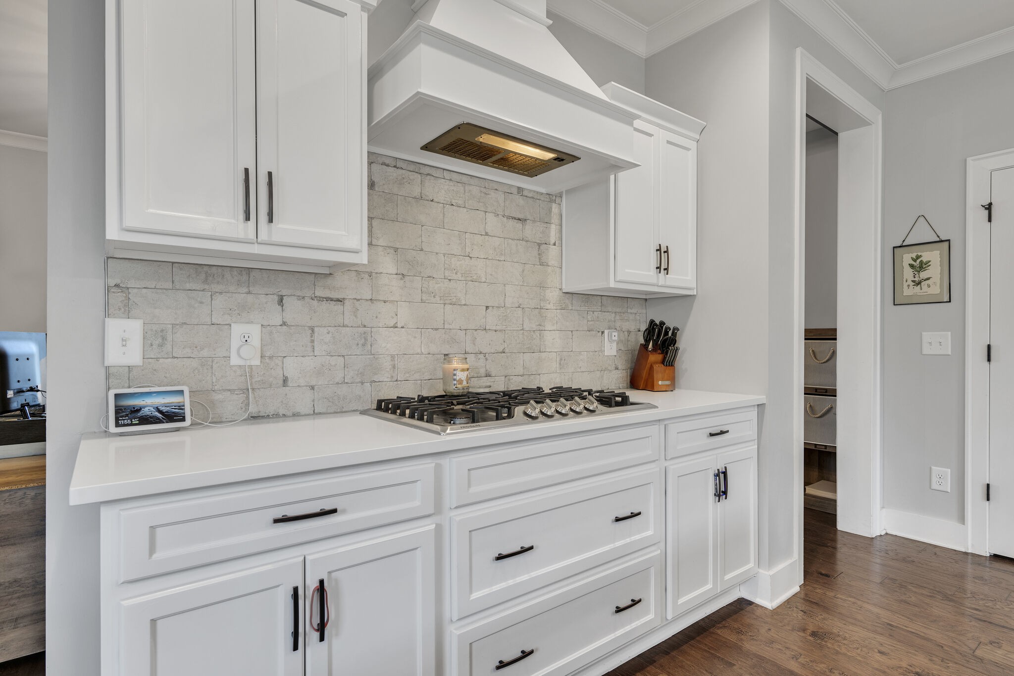 787 Plowson Road Mount Juliet, TN 37122 - Photo 7 of 30 a kitchen with white cabinets and white appliances