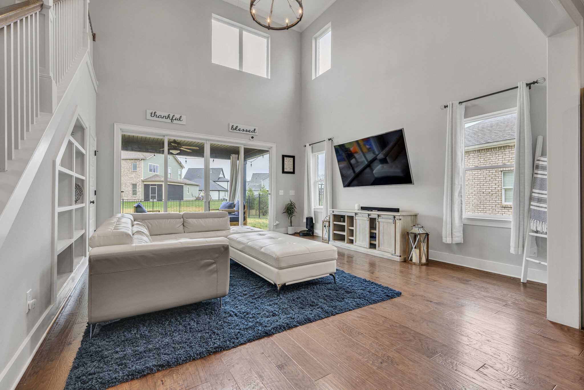 787 Plowson Road Mount Juliet, TN 37122 - Photo 8 of 30 a living room with furniture and a flat screen tv