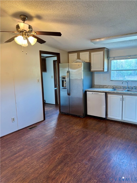 1225 Beech Forest Road Kenbridge, VA 23944 - Photo 12 of 33 a view of a kitchen with a sink and cabinet wooden floor