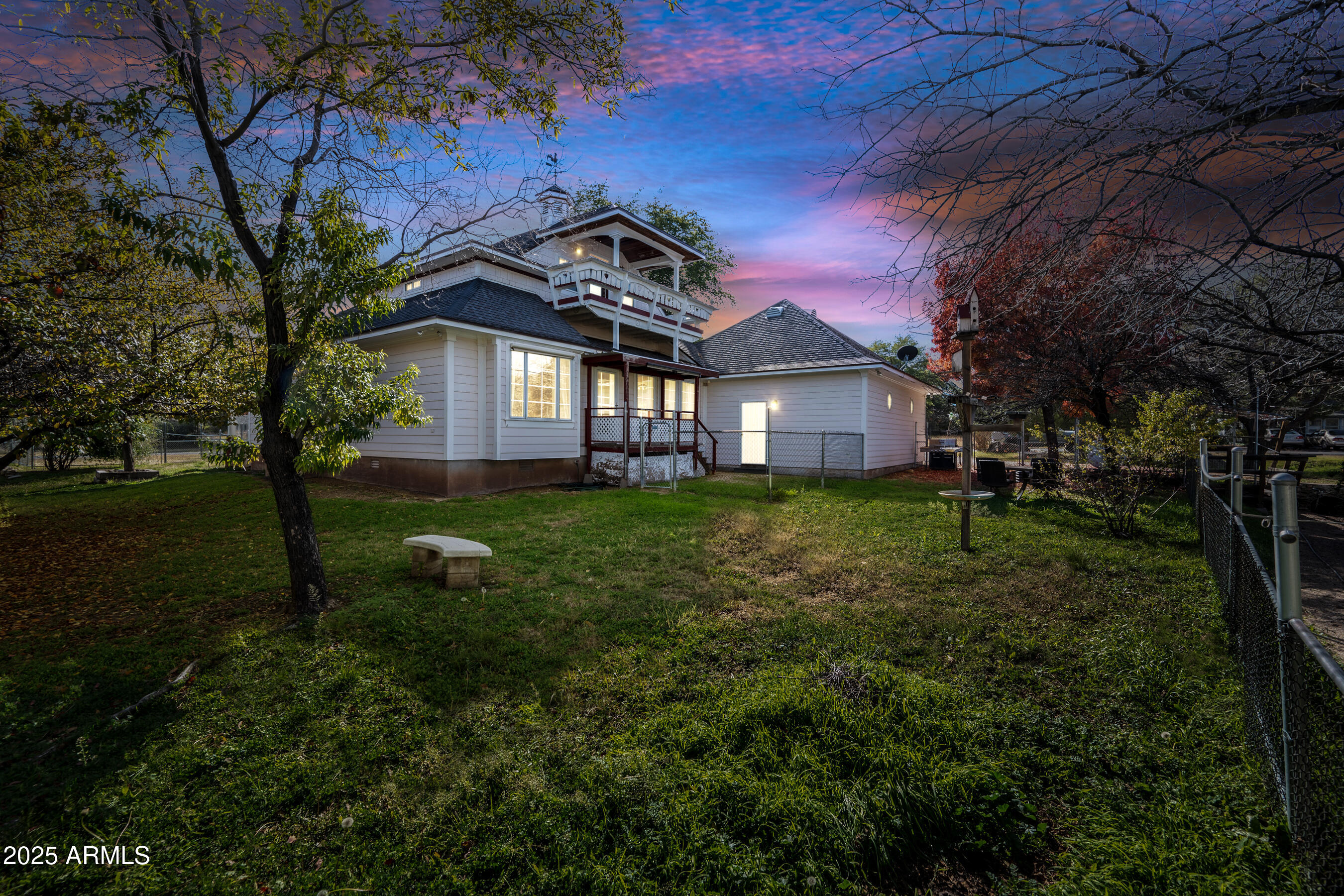 17288 Foothill Road Yarnell, AZ 85362 - Photo 75 of 79 a front view of a house with a garden and trees