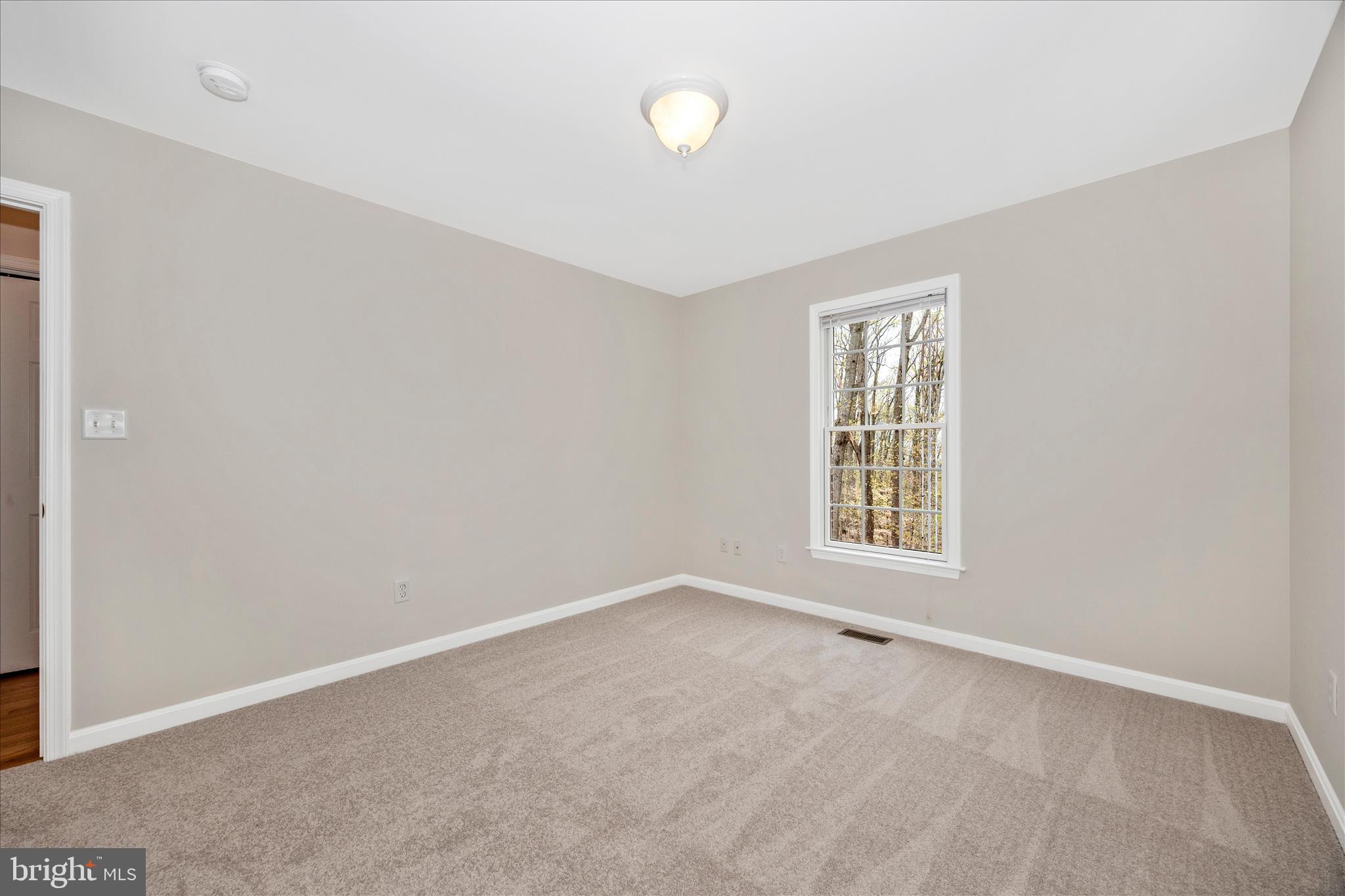 10393 Liberty Road Frederick, MD 21701 - Photo 34 of 47 an empty room with a window