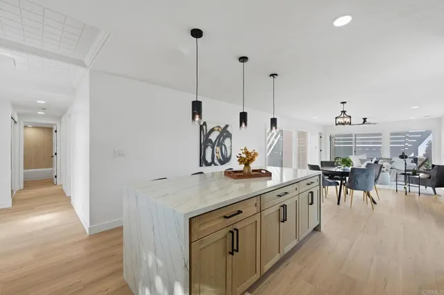 a view of a kitchen center island table and chairs