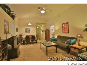 2032 Mango Tree Drive Edgewater, FL 32141 - Photo 6 of 24 a living room with furniture and a couch
