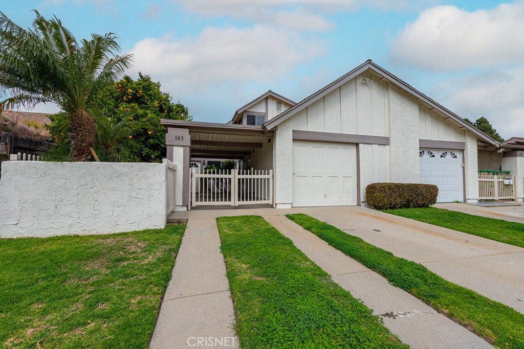 165 Ripley Street Camarillo, CA 93010 - Photo 1 of 1 a front view of house with yard and green space
