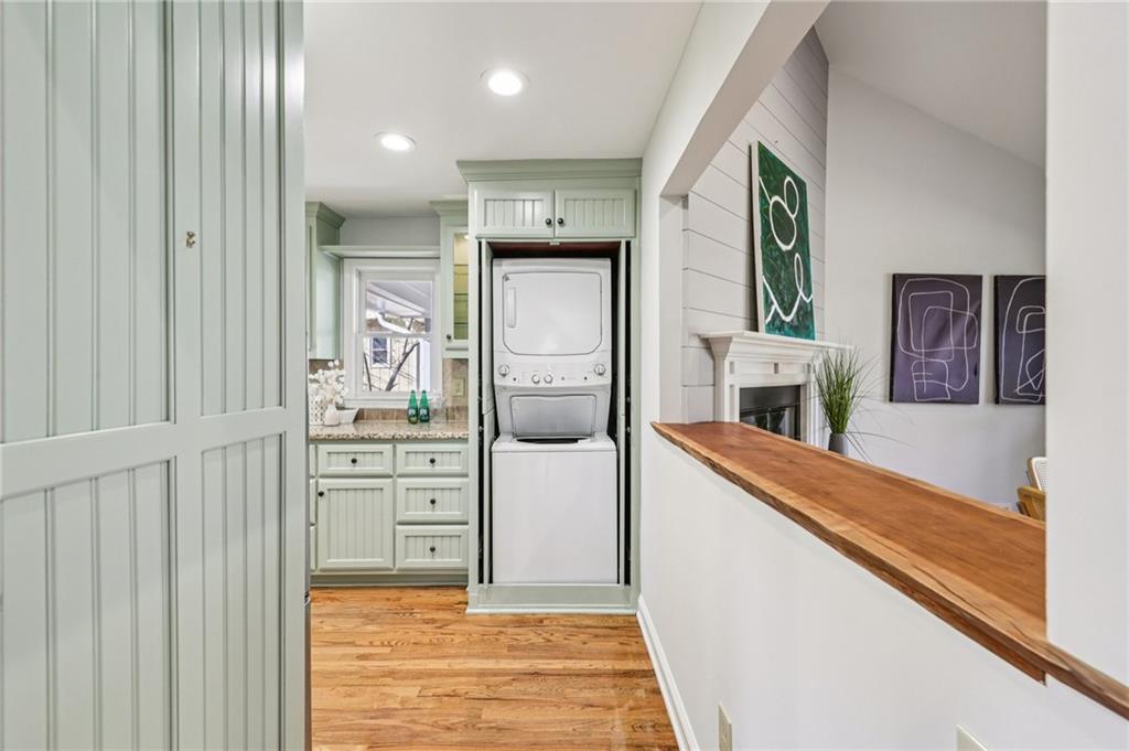 1173 Willivee Drive Decatur, GA 30033 - Photo 13 of 35 a hallway with cabinets and wooden floor