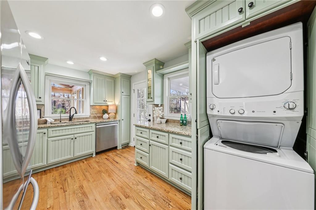 1173 Willivee Drive Decatur, GA 30033 - Photo 14 of 35 a kitchen with a stove refrigerator and sink