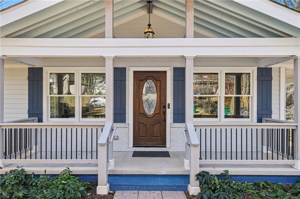 1173 Willivee Drive Decatur, GA 30033 - Photo 2 of 35 a front view of a house with a porch