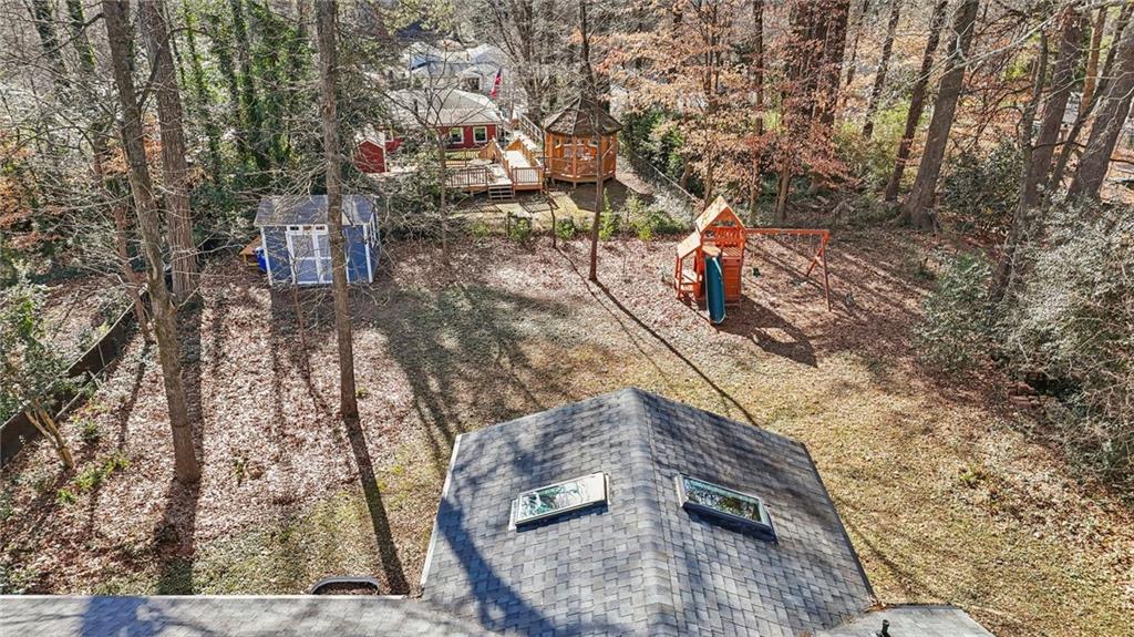 1173 Willivee Drive Decatur, GA 30033 - Photo 31 of 35 a backyard of a house with a yard and large trees