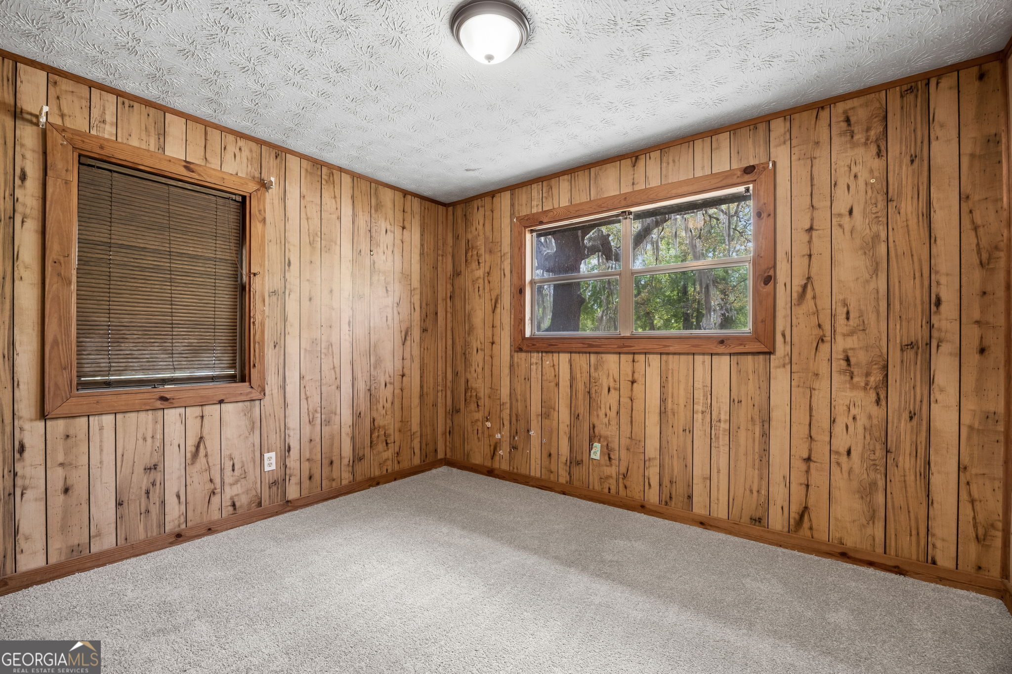 14 Graham Lane St. George, GA 31562 - Photo 14 of 21 an empty room with windows