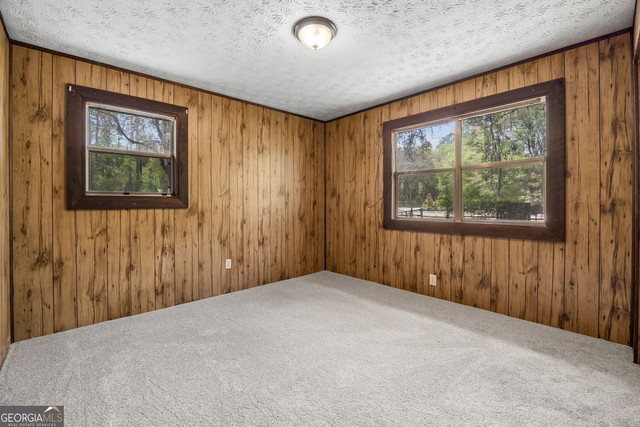 14 Graham Lane St. George, GA 31562 - Photo 17 of 21 a view of a livingroom with a window
