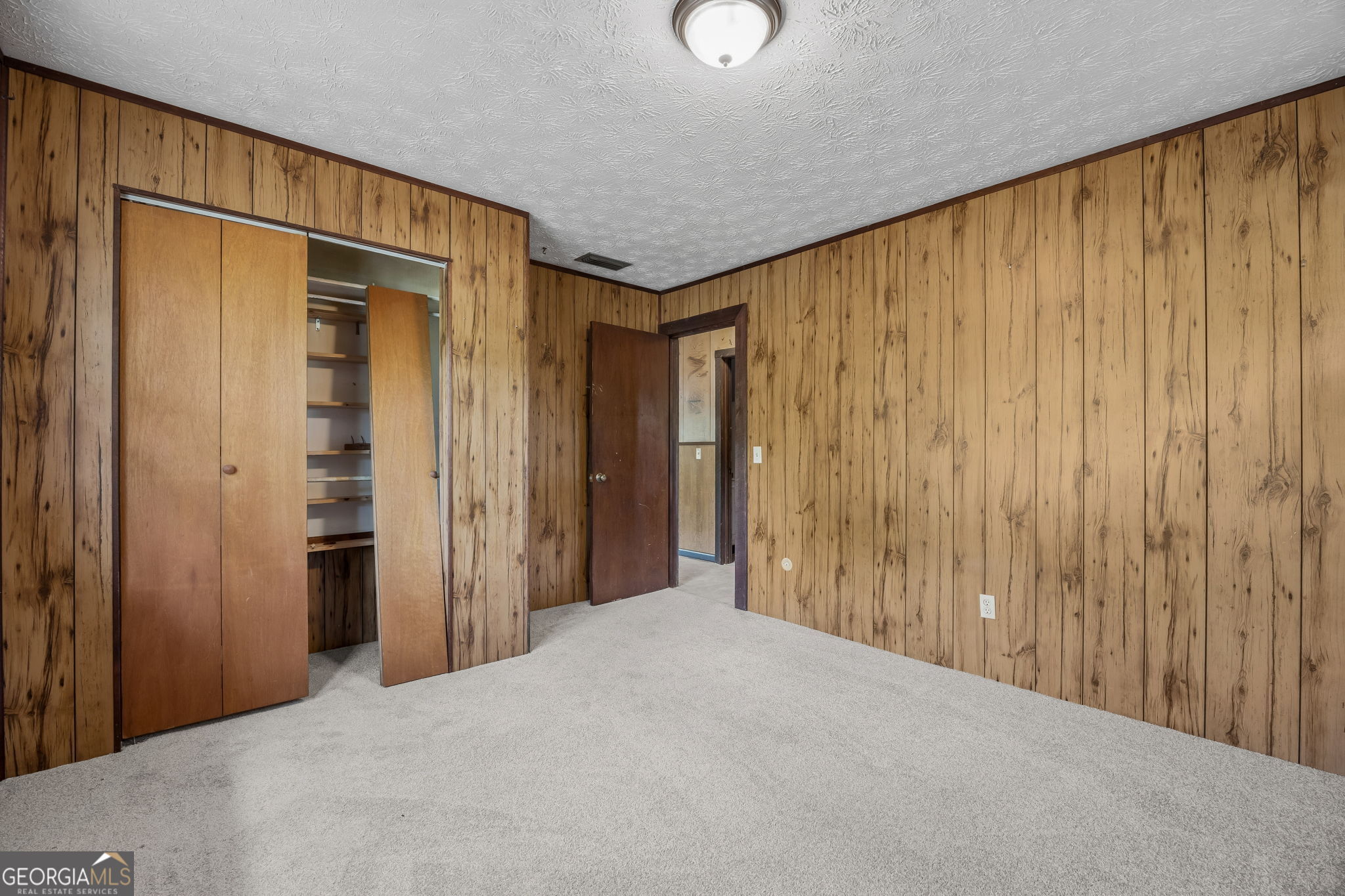 14 Graham Lane St. George, GA 31562 - Photo 18 of 21 a view of a room with a wooden walls