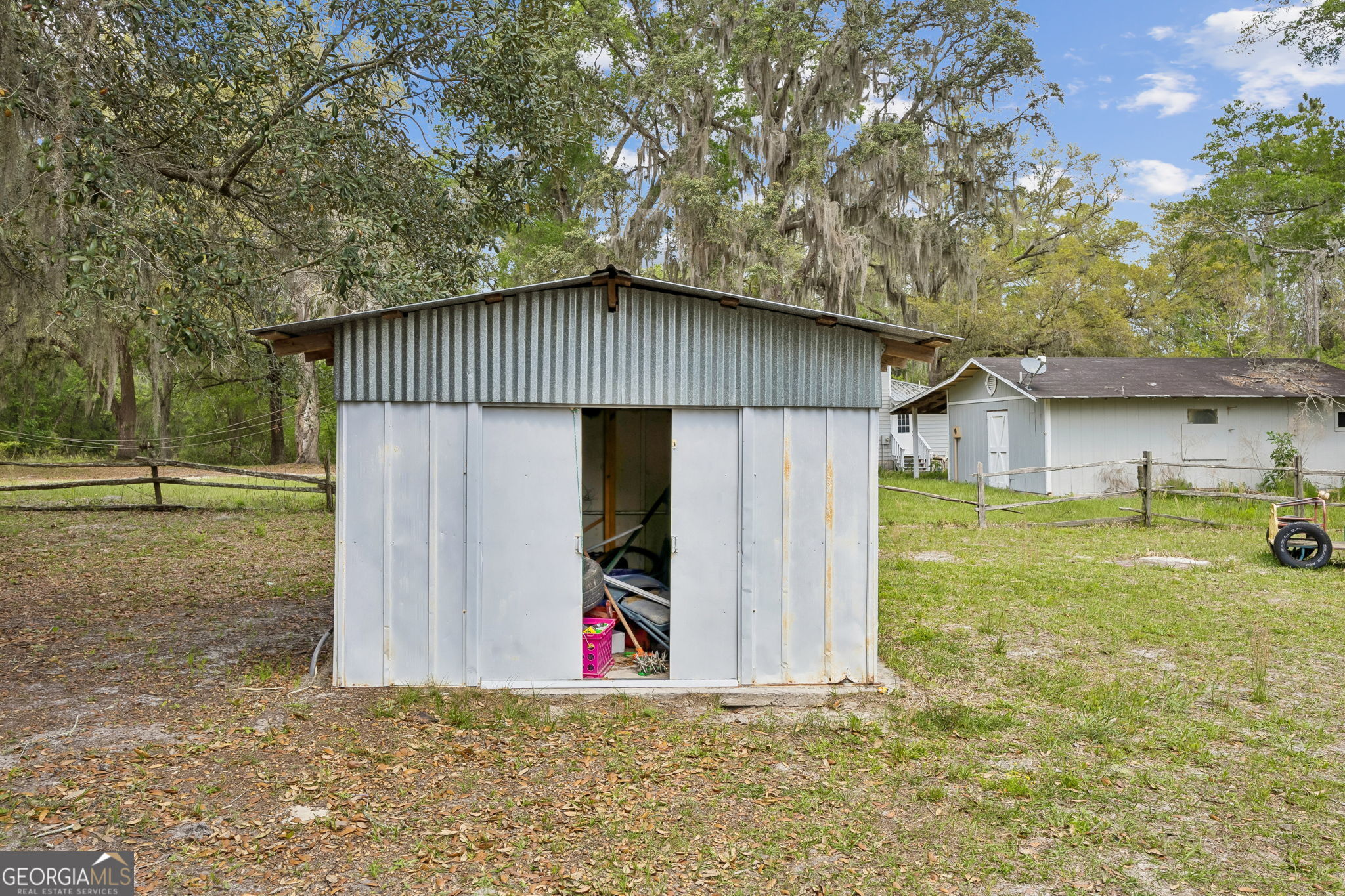 14 Graham Lane St. George, GA 31562 - Photo 21 of 21 a front view of a house with garden