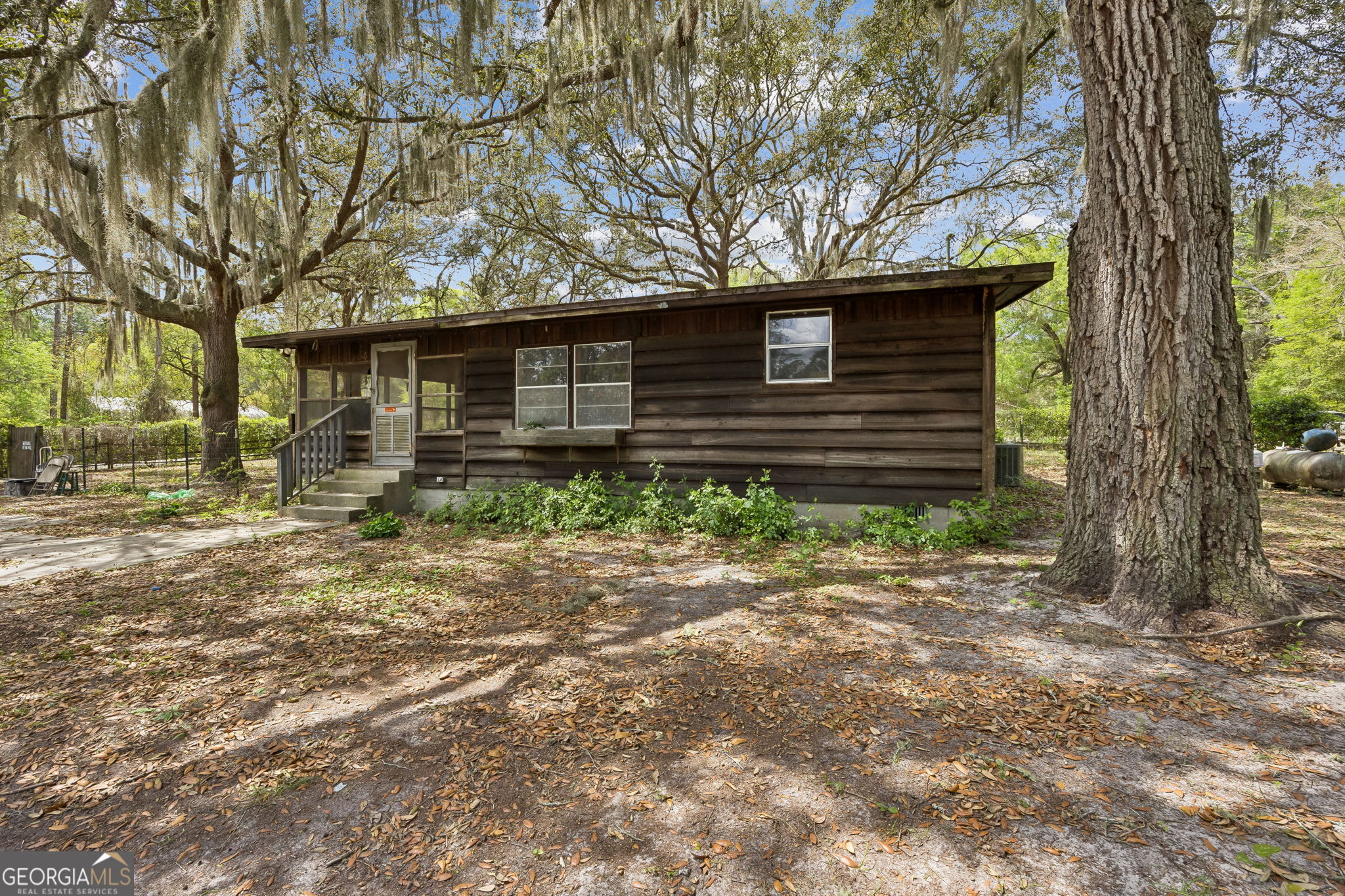 14 Graham Lane St. George, GA 31562 - Photo 3 of 21 a front view of house with yard