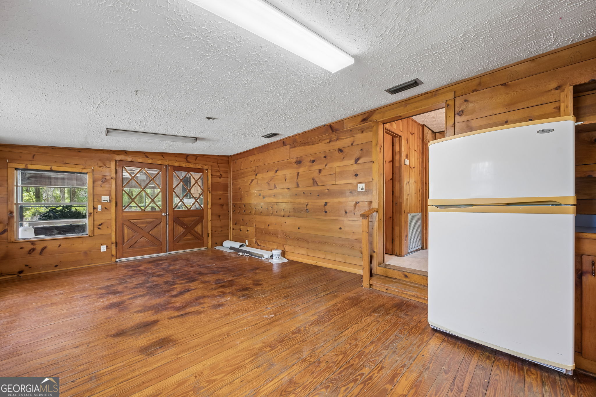 14 Graham Lane St. George, GA 31562 - Photo 7 of 21 a view of an empty room with a window