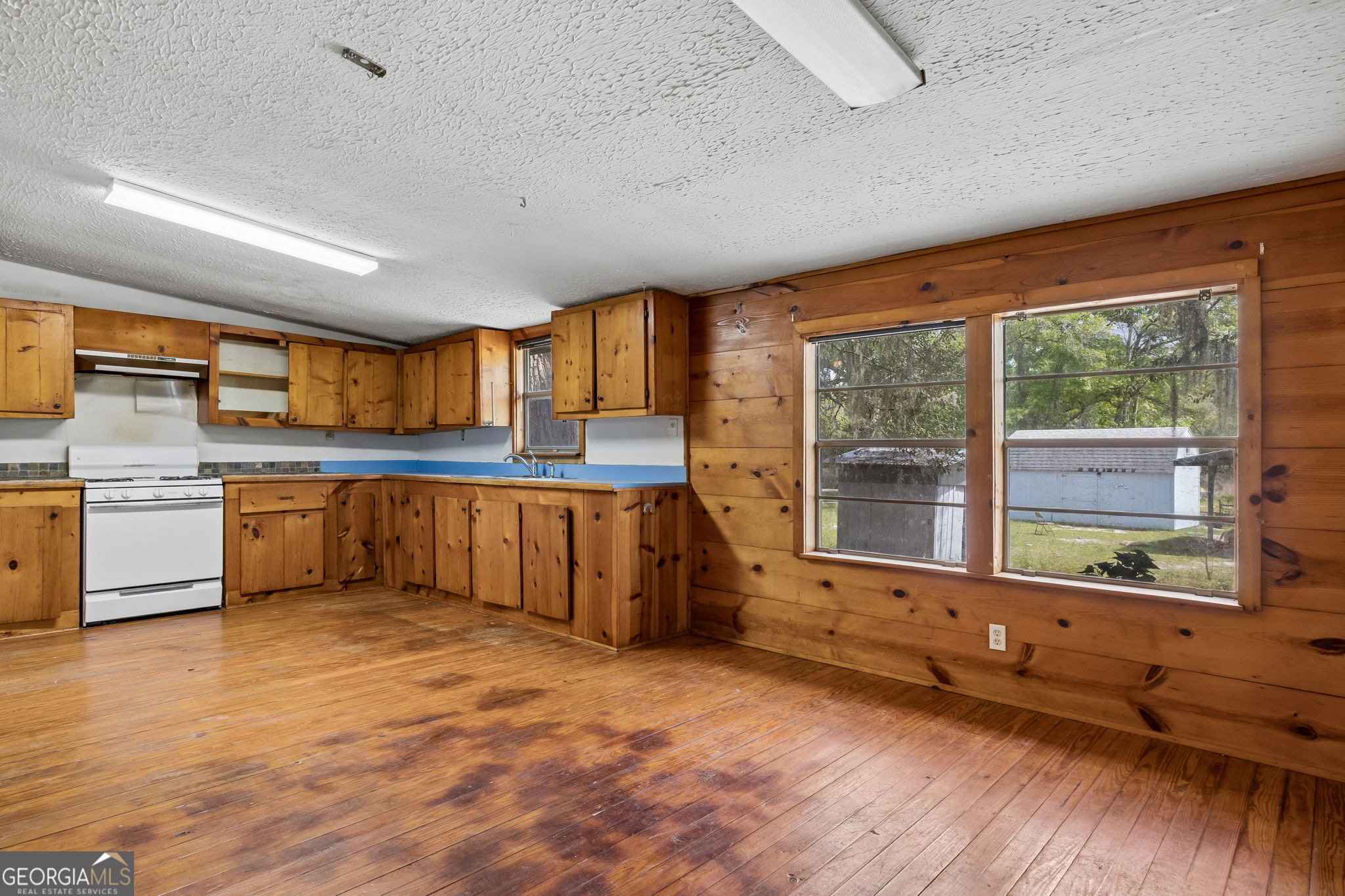 14 Graham Lane St. George, GA 31562 - Photo 9 of 21 a kitchen with stainless steel appliances granite countertop a stove and a refrigerator
