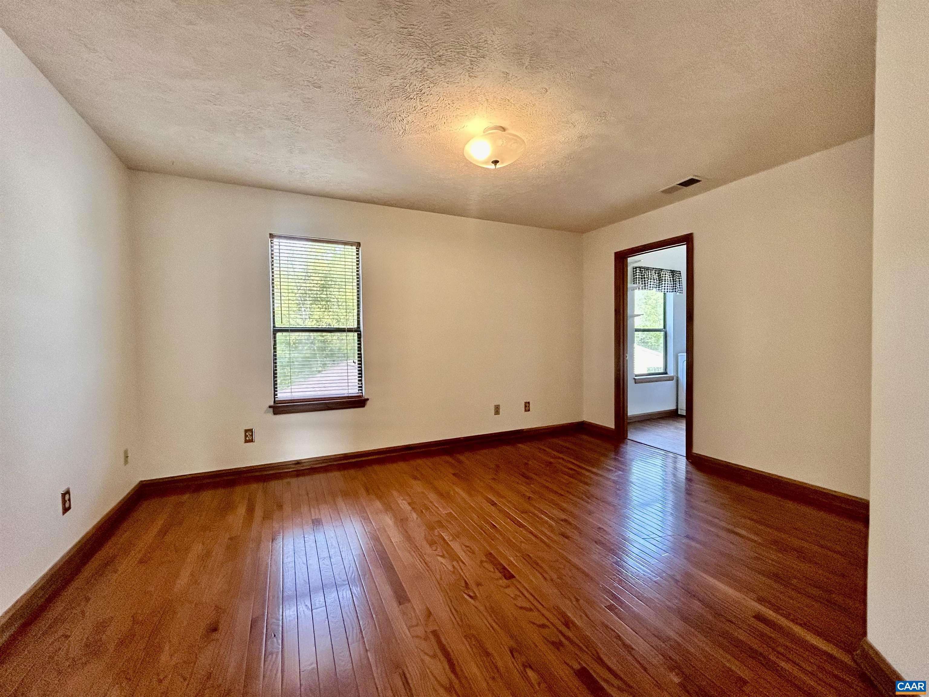 1 Old Mill Court Palmyra, VA 22963 - Photo 13 of 19 an empty room with wooden floor and windows