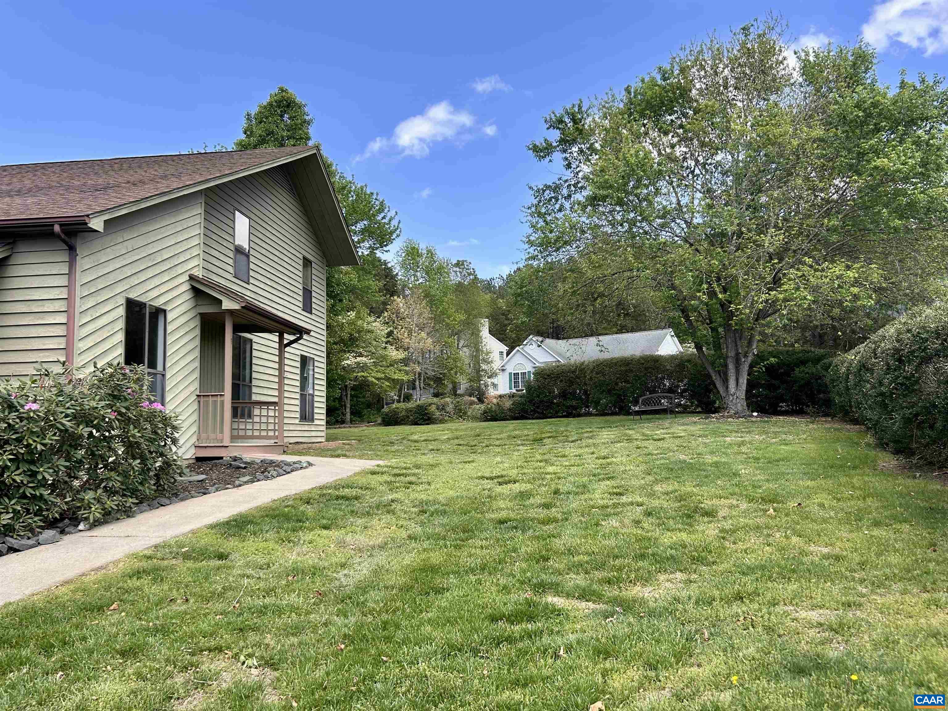 1 Old Mill Court Palmyra, VA 22963 - Photo 2 of 19 a front view of a house with a garden
