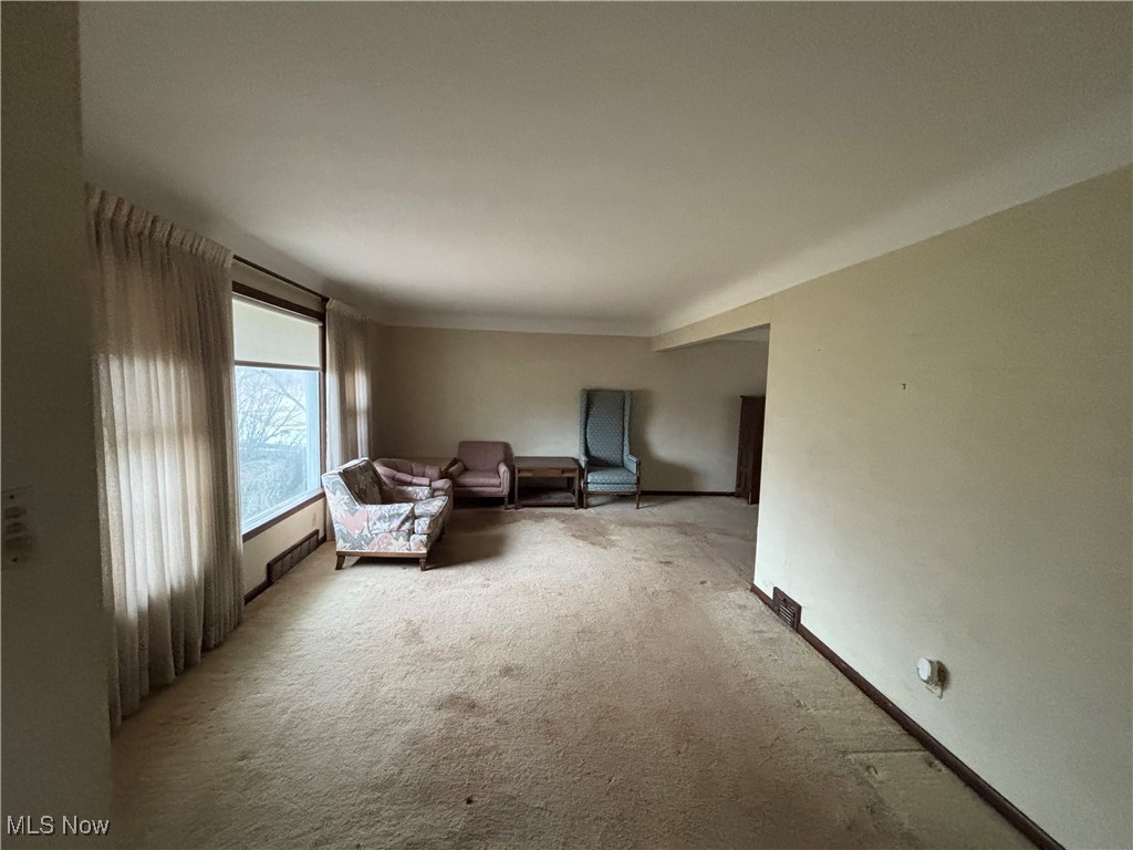 4308 Silsby Road University Heights, OH 44118 - Photo 5 of 28 Unfurnished living room with light carpet