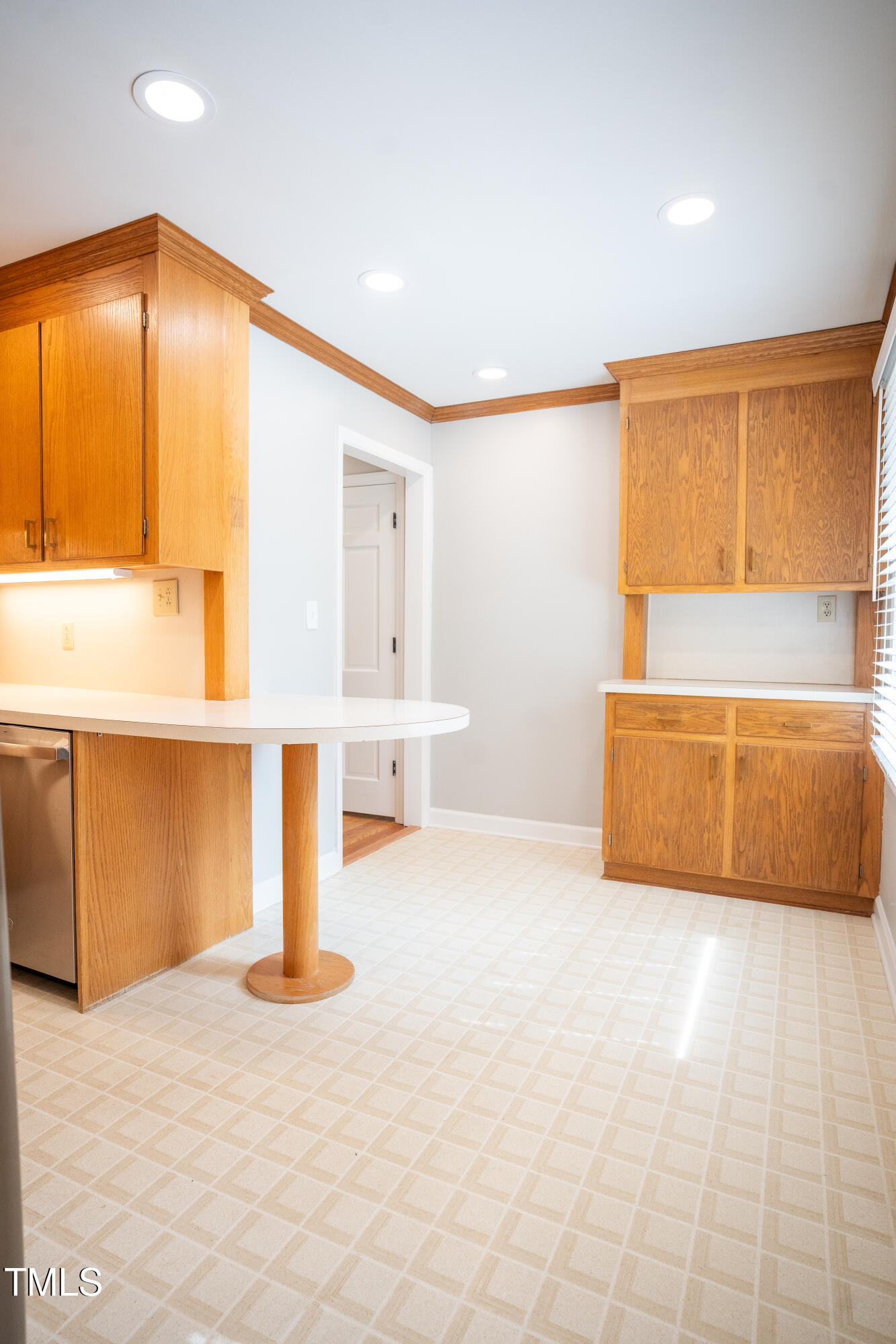 4813 Glen Forest Drive Raleigh, NC 27612 - Photo 11 of 39 a view of an empty room with a window