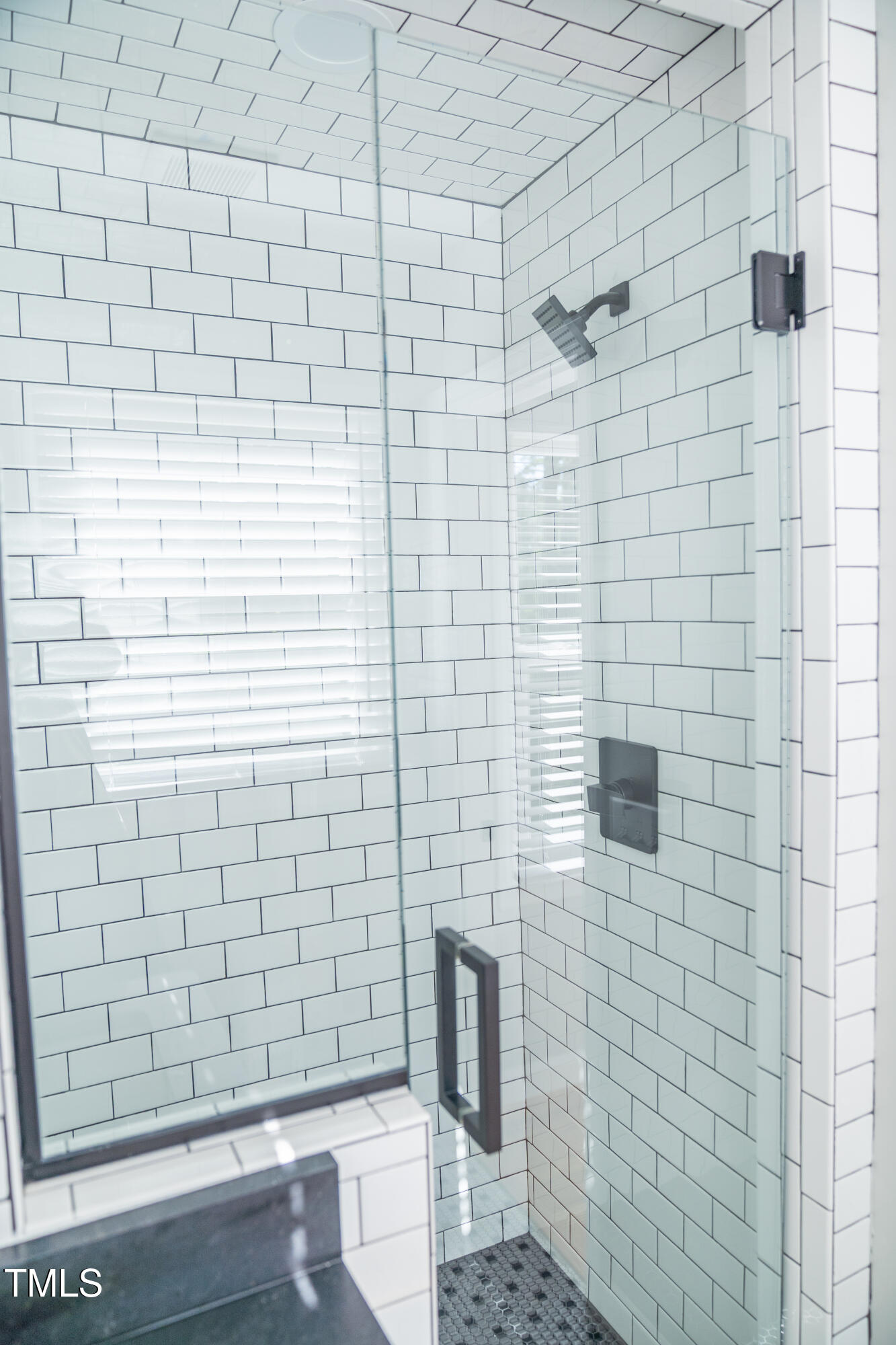 4813 Glen Forest Drive Raleigh, NC 27612 - Photo 22 of 39 a bathroom with a shower