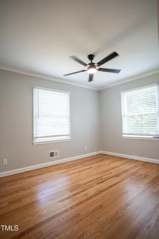 a bathroom with a granite countertop sink a bathtub and a shower