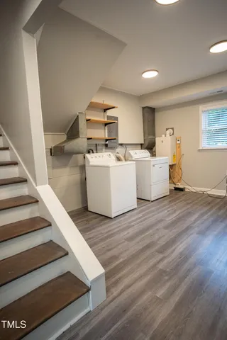 a bathroom with a sink a mirror and a shower