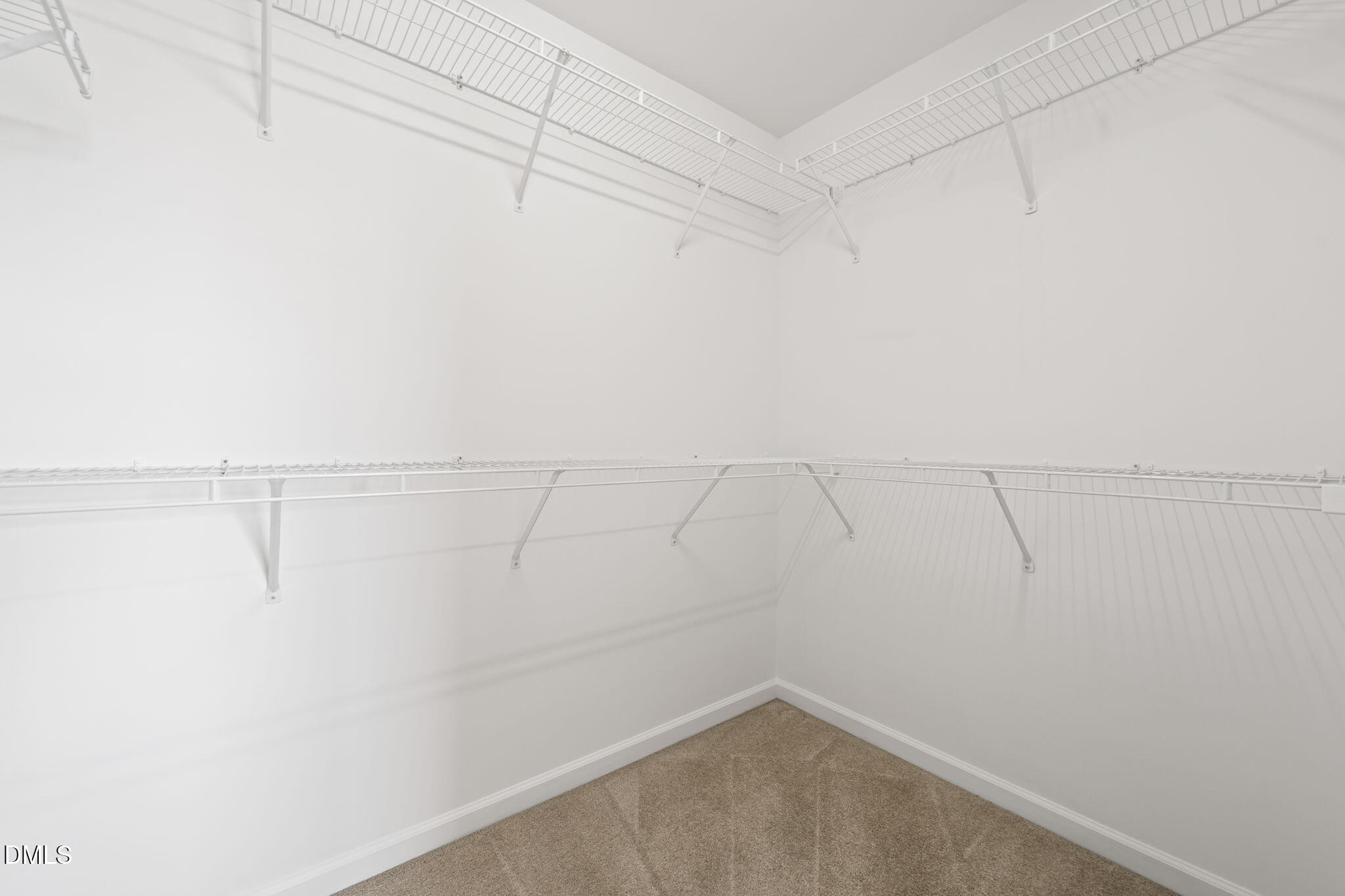 9226 Wooden Road Raleigh, NC 27617 - Photo 19 of 56 Primary Bedroom Walk in Closet