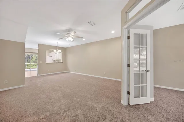 a view of a park with large trees