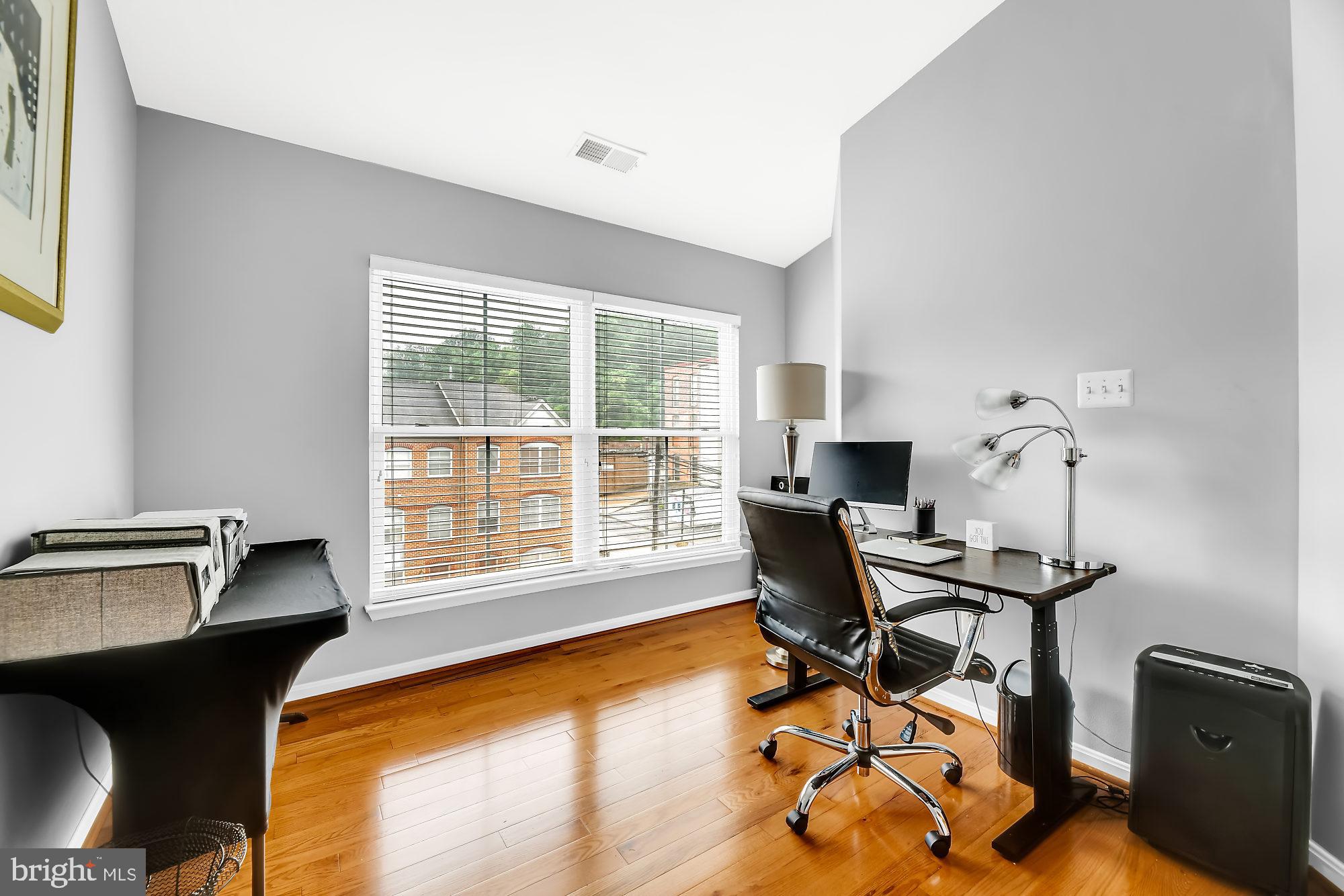 2090 Clipper Park Road Baltimore, MD 21211 - Photo 21 of 75 a view of a workspace with furniture and a window