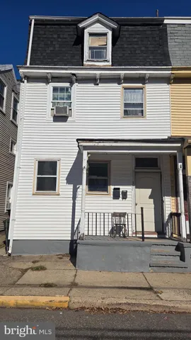 a view of a house with a balcony