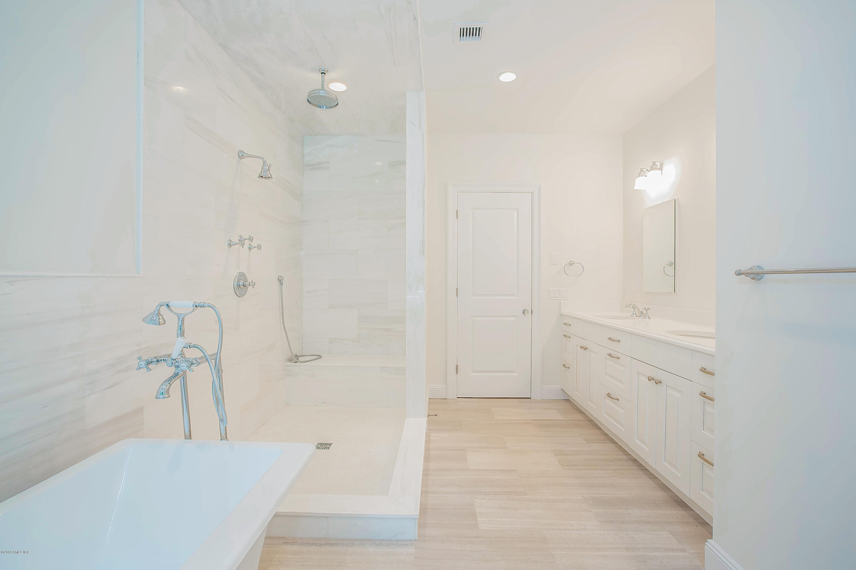 54 Dandy Drive Cos Cob, CT 06807 - Photo 17 of 35 a bathroom with a bathtub and shower