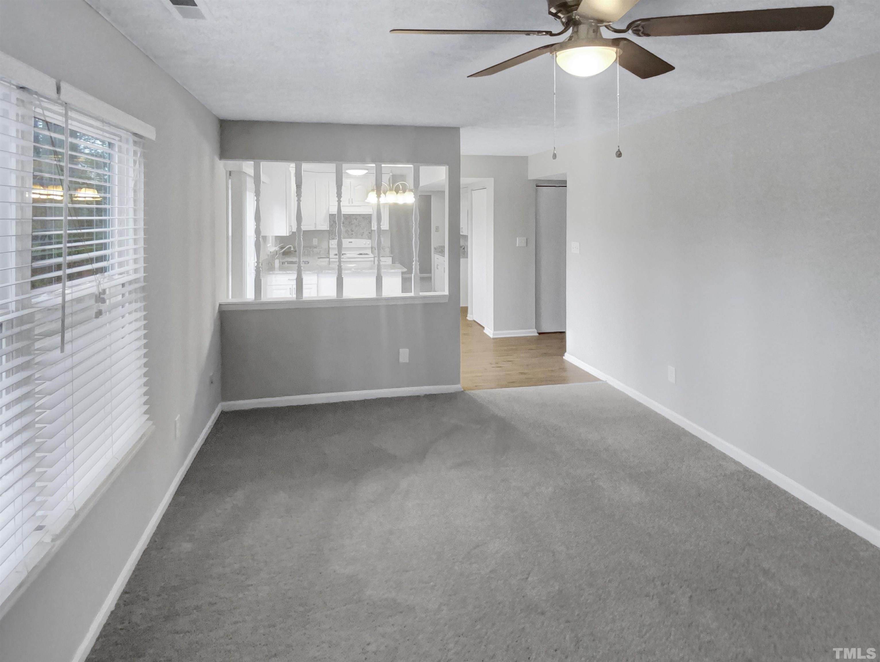 2404 Tusket Court Raleigh, NC 27613 - Photo 2 of 19 a view of an empty room with a window