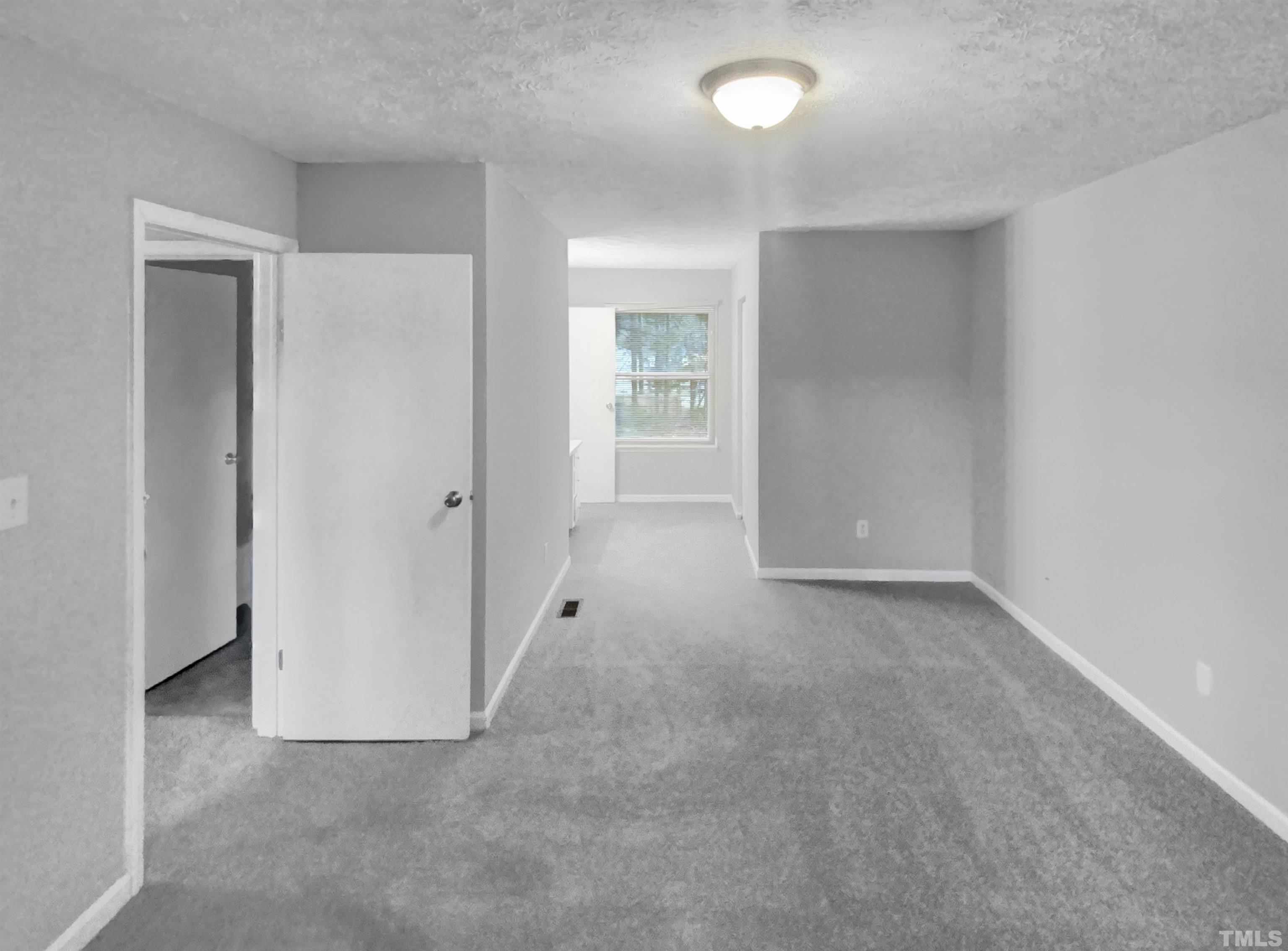 2404 Tusket Court Raleigh, NC 27613 - Photo 4 of 19 a view of an empty room