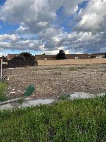 a view of a lake with a big yard