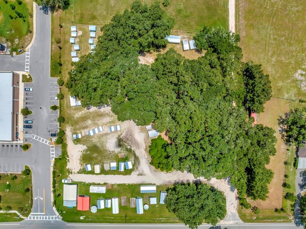 13285 Highway 92 Dover, FL 33527 - Photo 13 of 76 a sign that is sitting on a brick wall