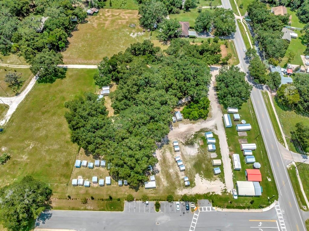13285 Highway 92 Dover, FL 33527 - Photo 20 of 76 an aerial view of a residential houses with yard and lake view