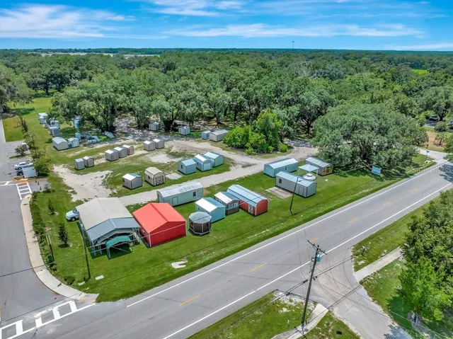 a view of a street with an outdoor space