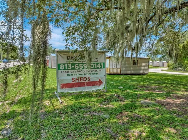 a house view with a garden space