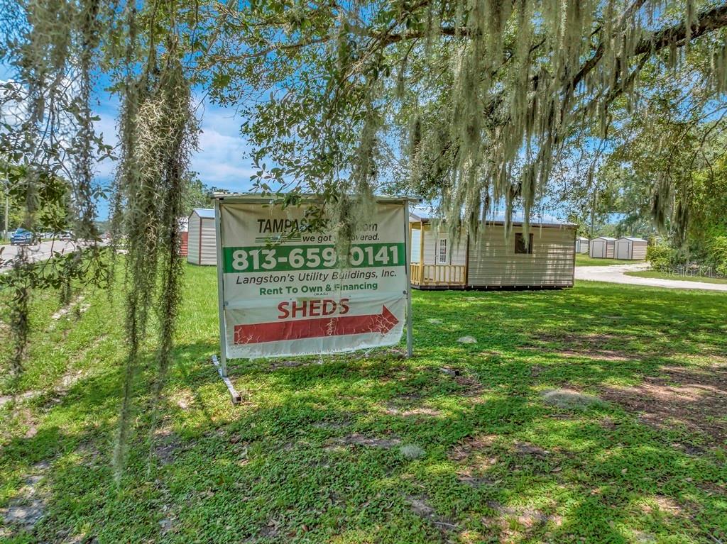 13285 Highway 92 Dover, FL 33527 - Photo 33 of 76 a sign on the side of the tree